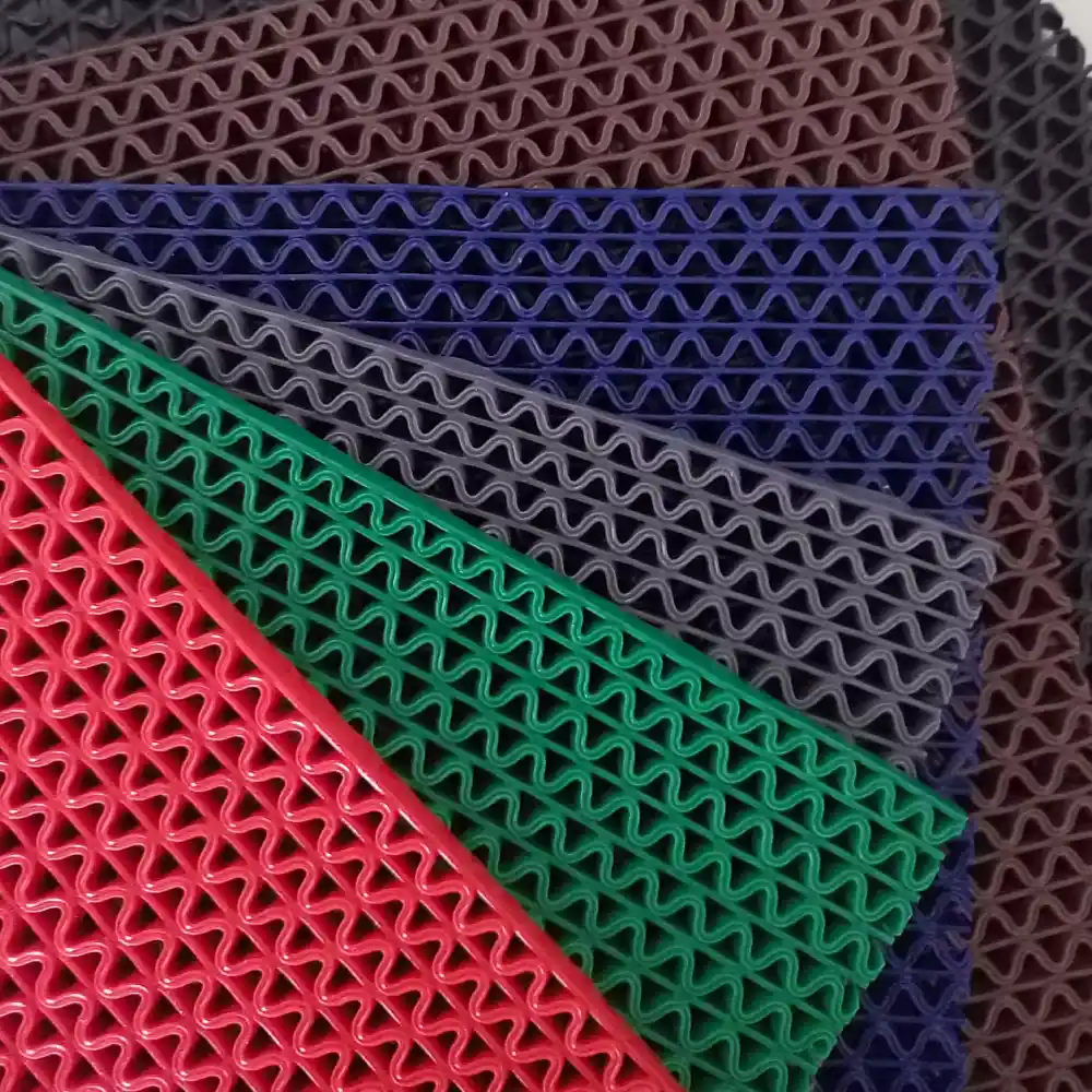 Durable PVC Mats with a textured surface for waterproof floor protection.