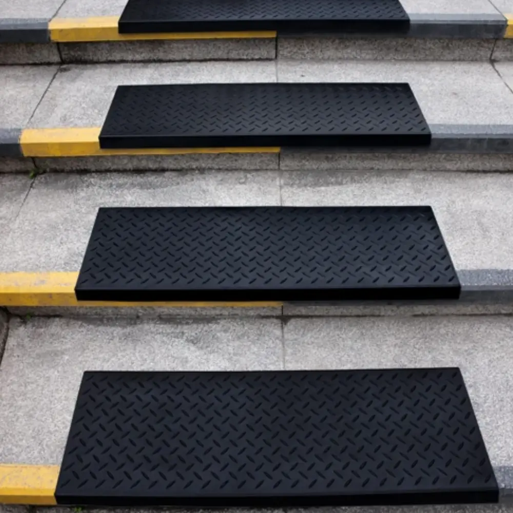 Heavy-duty black Rubber Stair Mats providing a stable, slip-resistant walking surface.