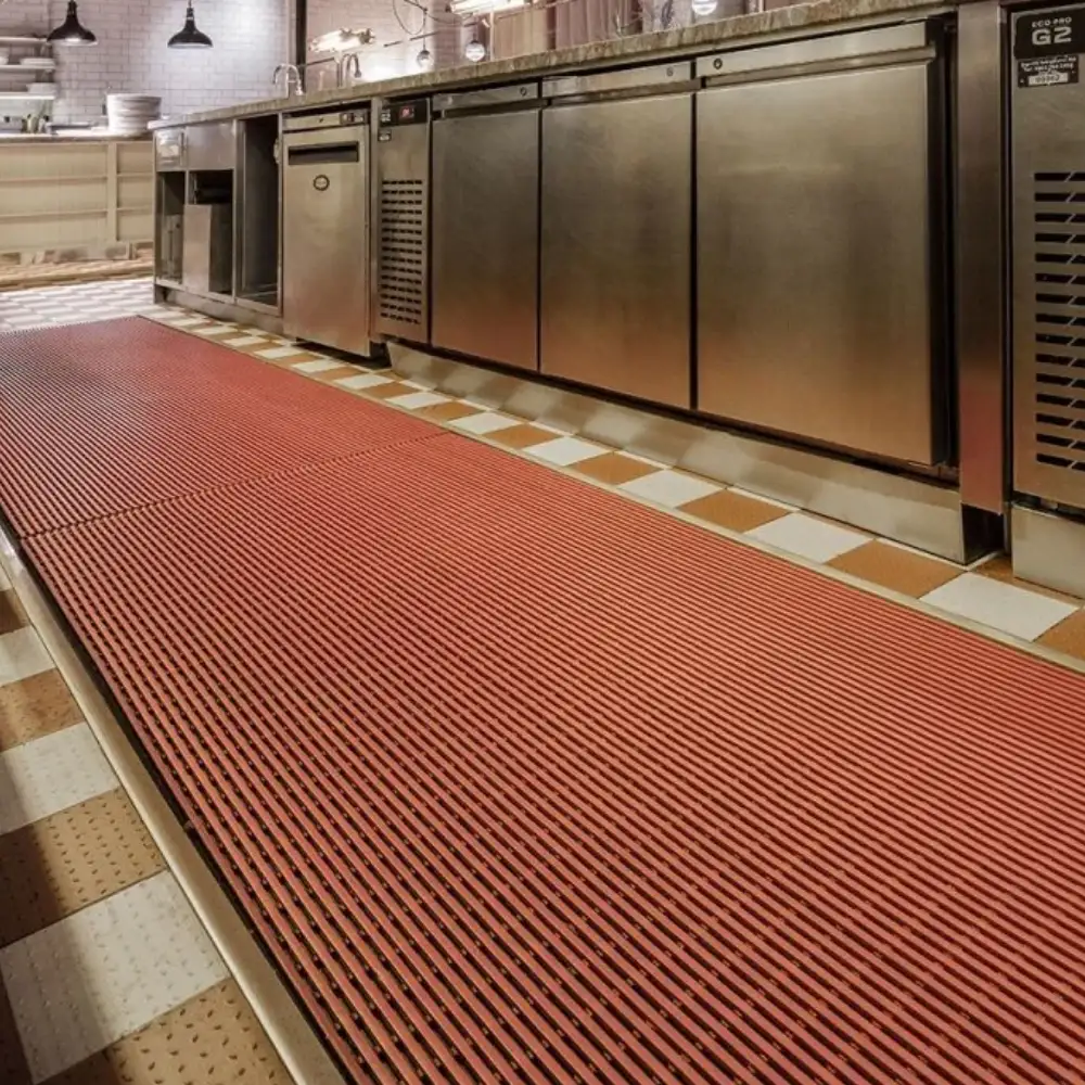 Non-slip restaurant mats on a tiled floor to ensure a clean and safe dining environment