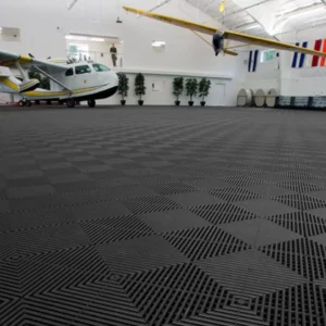 Premium garage floor tiles professionally installed in MJL Al Jazi private plane room