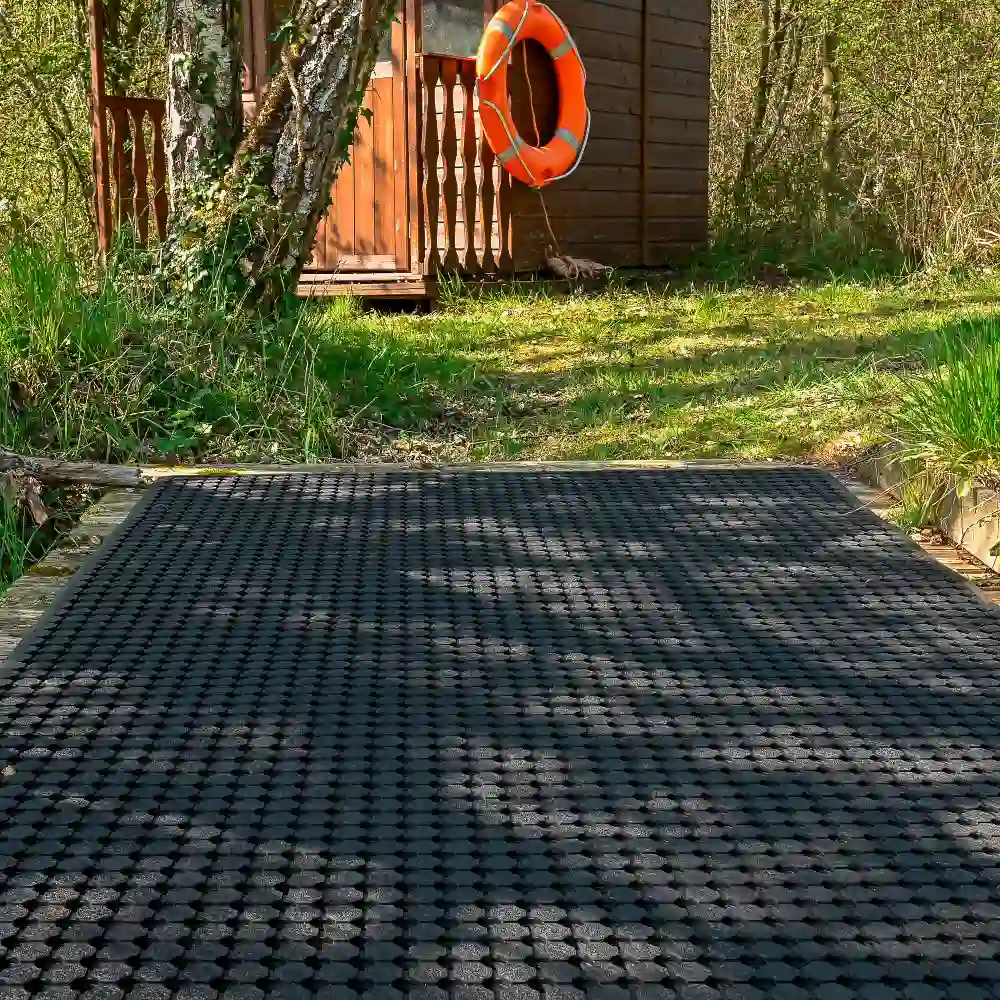 Weather-resistant outdoor mat Dubai placed on a modern patio & garden.