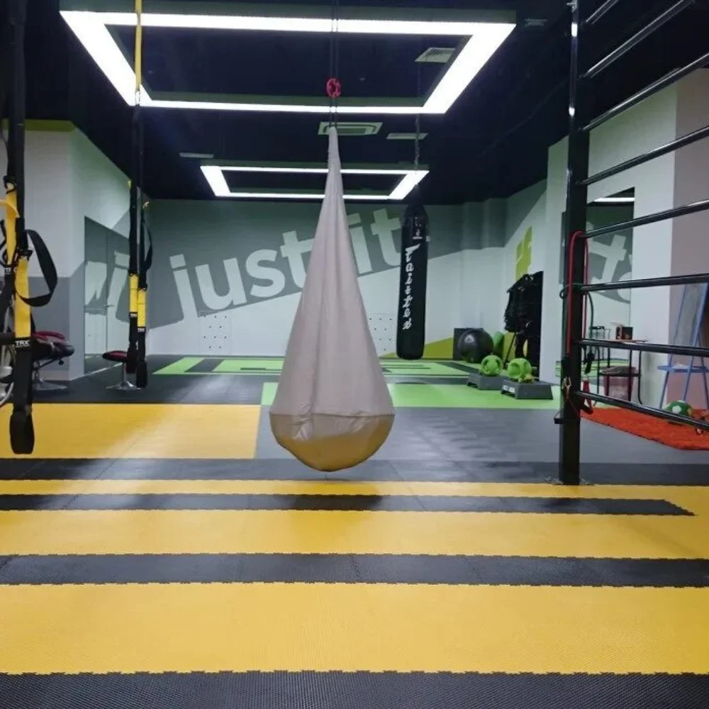 Rubber flooring Dubai installed at athletic training center.