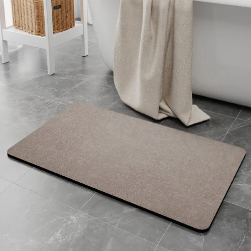 Luxury diatomite bath mats with anti-slip base and rapid water absorption for daily use.