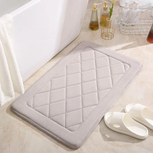 Memory foam bath mats with ultra-soft cushioning and anti-slip backing for bathroom comfort
