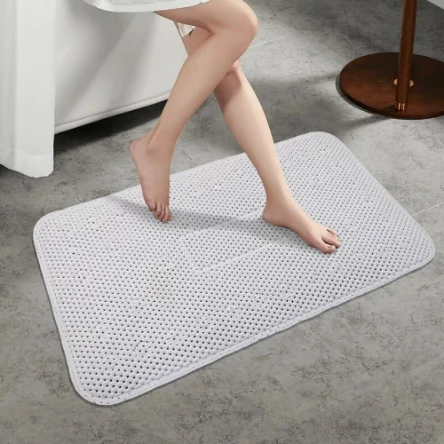 Mini bubble bath mat with anti-slip suction cups for safe and comfortable shower use