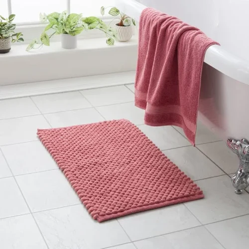 Non-slip pebble bath mat for showers and bathrooms with durable waterproof construction