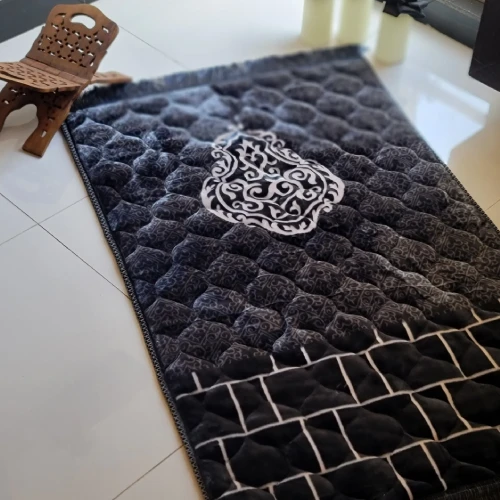 Premium foam prayer mats dubai fitted in a commercial prayer room with luxury Islamic carpet designs.
