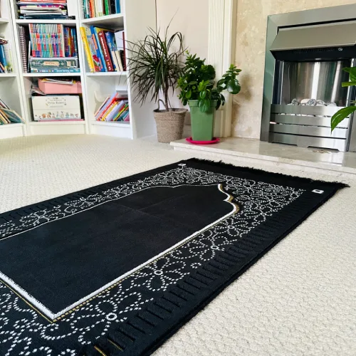 Professional prayer mats Dubai supply and installation project with elegant mihrab pattern designs.