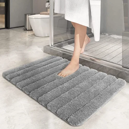 Soft microfiber bath mat with non-slip base for clean, dry and comfortable bathroom floors