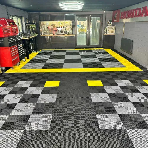 Heavy-duty interlocking mats for workshop floors exposed to tools, oil and equipment