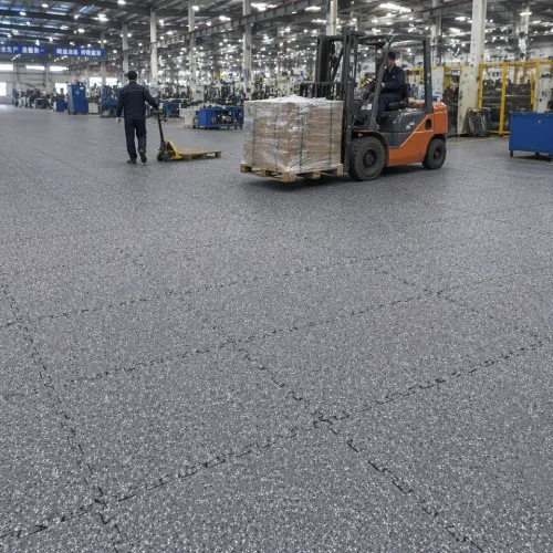 Interlocking rubber mats for warehouse aisles, factory workstations and demanding industrial areas