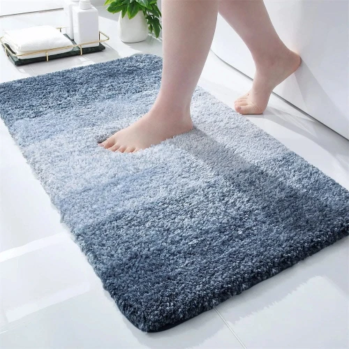 Premium non-slip bath mat placed at a modern bathroom entrance for comfort and floor safety