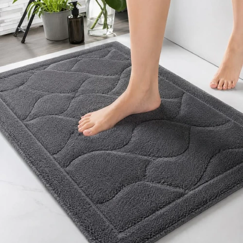 Rectangular microfiber rug offering soft cushioning and excellent water absorption