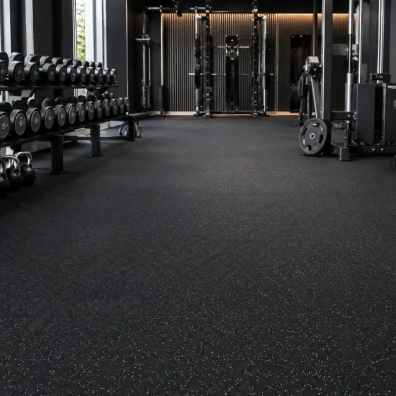 Shock-absorbing rubber flooring for gyms that improves safety, traction and workout comfort.